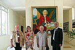 А.Б.Зезин, Е.С.Локтева, Е.И.Андрейков и Х.Одинаев у портрета М.В.Ломоносова работы местного художника